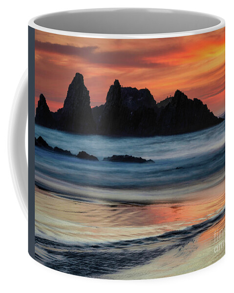 Oregon Coffee Mug featuring the photograph Fiery sunset #1 by Izet Kapetanovic