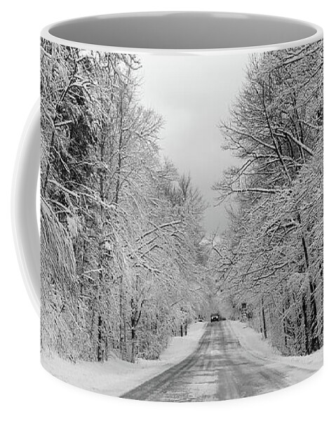 Back Road Coffee Mug featuring the photograph Traveling Through the Fresh Snow by David T Wilkinson