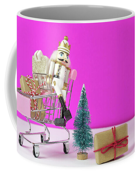 Christmas Coffee Mug featuring the photograph Shopping cart full of Christmas gifts, tree and nutcracker ornament. #1 by Milleflore Images