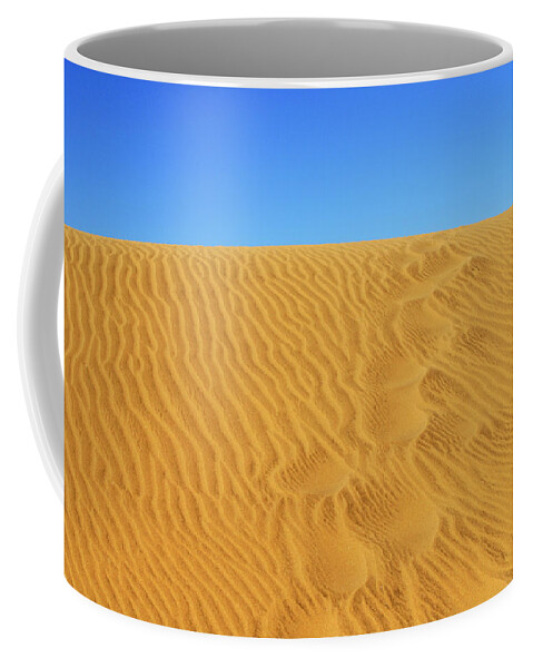 Textured Golden Sand Coffee Mug featuring the photograph Textured golden sand #1 by Severija Kirilovaite
