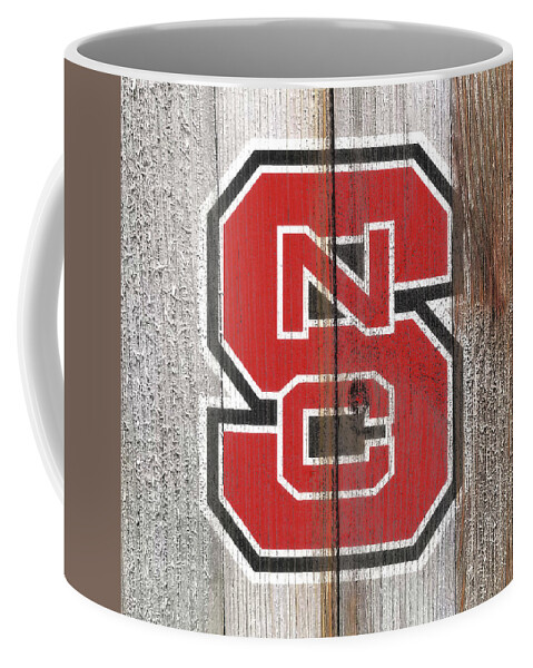 The Nc State Wolfpack Coffee Mug featuring the mixed media The NC State Wolfpack #2 by Brian Reaves