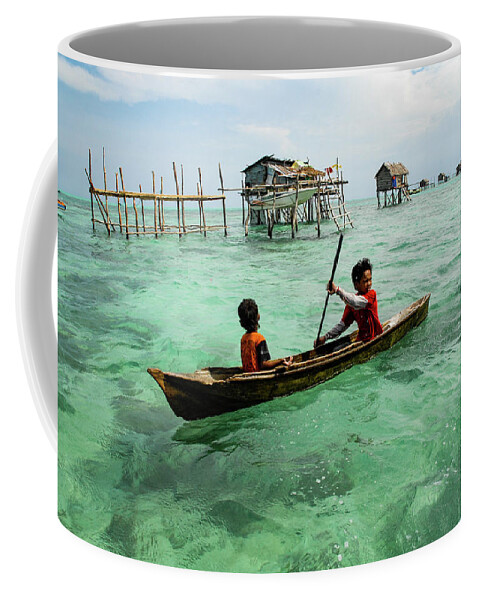 Sea Coffee Mug featuring the photograph Neptune's Children - Sea Gypsy Village, Sabah. Malaysian Borneo by Earth And Spirit