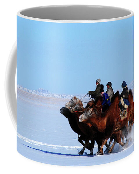 Winter Camel Racing Coffee Mug featuring the photograph Winter Camel racing by Elbegzaya Lkhagvasuren