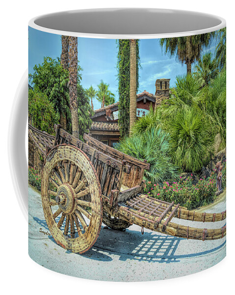 Barbara Snyder Coffee Mug featuring the photograph Wood Hand Cart at Jackalope Ranch #1 by Barbara Snyder