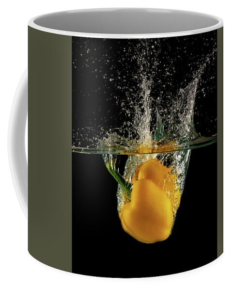 Pepper Coffee Mug featuring the photograph Yellow bell pepper dropped and slashing on water #2 by Michalakis Ppalis