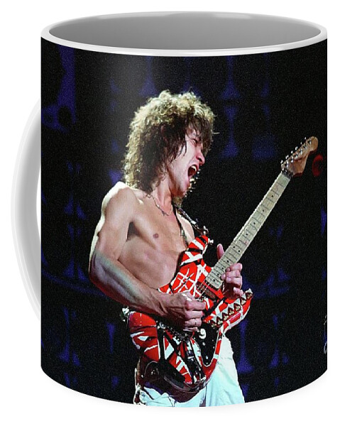 Eddie Coffee Mug featuring the photograph Eddie Van Halen by Action
