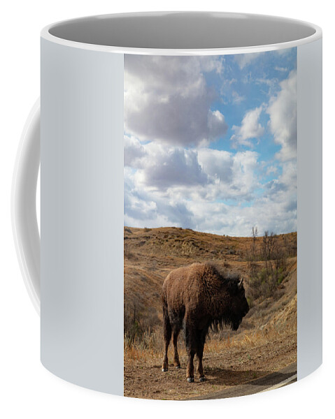 Buffalo Coffee Mug featuring the photograph Buffalo with clouds at Theodore Roosevelt National Park in North Dakota #4 by Eldon McGraw