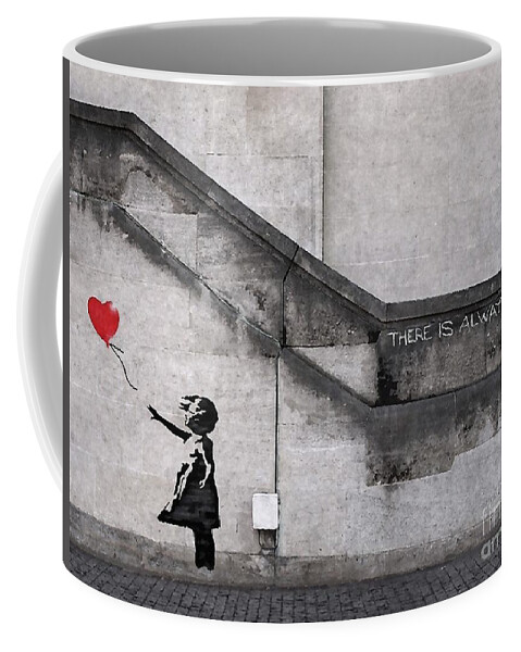 Banksy Coffee Mug featuring the mixed media Girl with Balloon by Banksy