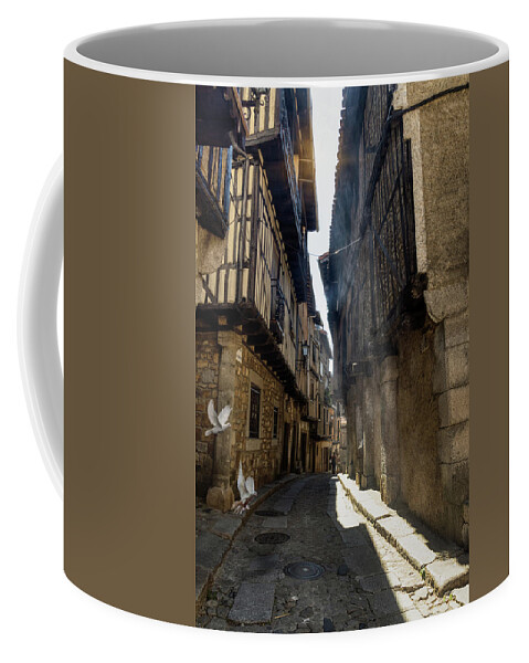 La Alberca Coffee Mug featuring the photograph A blade of sunshine in the alley by Micah Offman