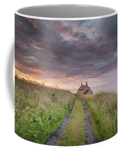 Northumberland Coffee Mug featuring the photograph A cottage by the sea by Anita Nicholson