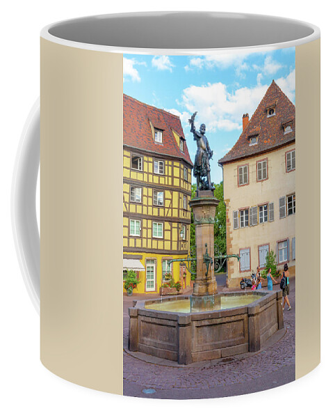 Travel Coffee Mug featuring the photograph A Fountain in Colmar by W Chris Fooshee