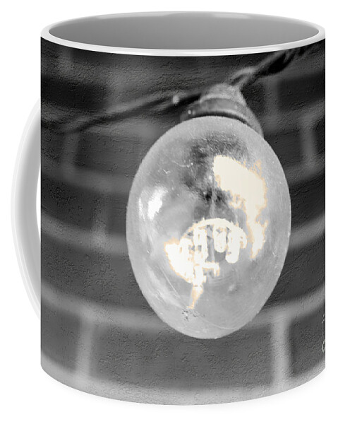 Light Coffee Mug featuring the photograph A light by Bentley Davis