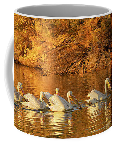 A Pod Of Pelicans Coffee Mug featuring the photograph A Pod of Pelicans by Priscilla Burgers