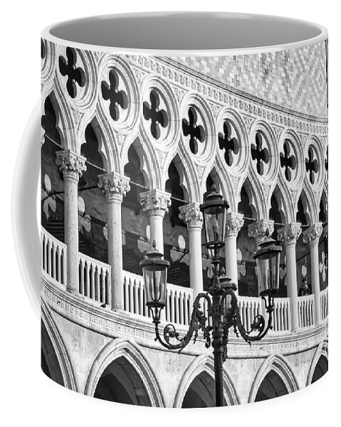 The Ducal Palace Coffee Mug featuring the photograph A typical Venetian street lamp in front of the Ducal Palace windows by Stefano Senise