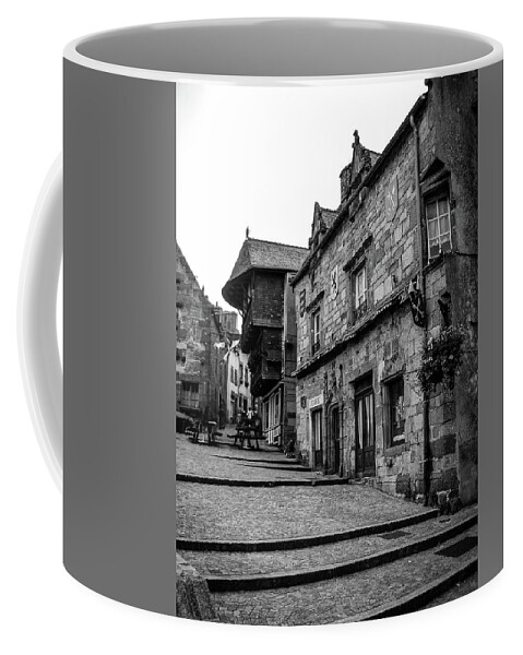 France Coffee Mug featuring the photograph A Walk through town by Jim Feldman