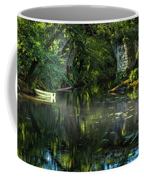 Waterway Coffee Mug featuring the photograph Abandoned boat by Micah Offman