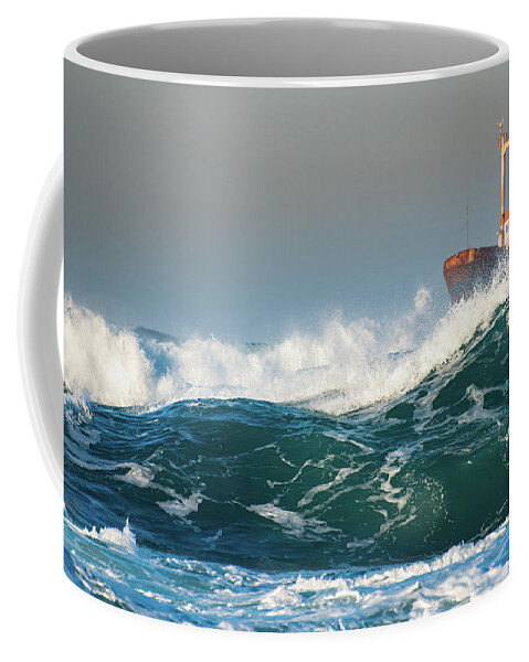 Shipwreck Coffee Mug featuring the photograph Abandoned ship in the stormy ocean by Michalakis Ppalis