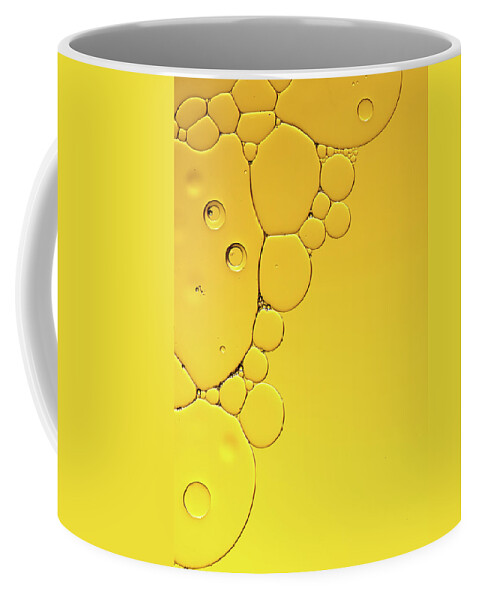 Fluid Coffee Mug featuring the photograph Abstract, image of oil, water and soap with colourful background by Michalakis Ppalis