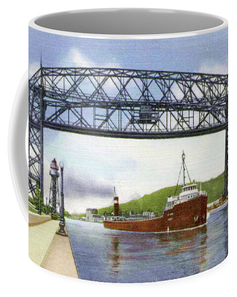 Duluth Coffee Mug featuring the photograph Aerial Lift Bridge with Freighter by Zenith City Press