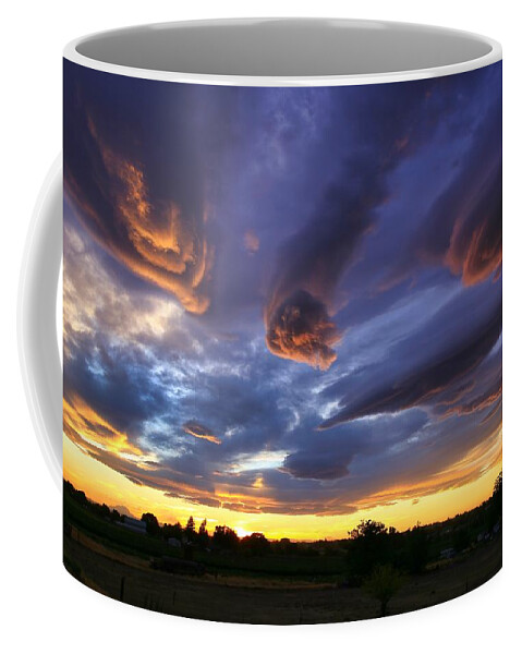 Alien Cloud Formations Coffee Mug featuring the photograph Alien cloud formations by Lynn Hopwood