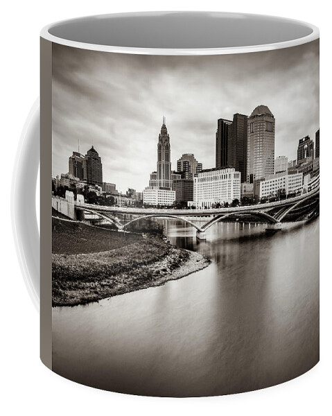 Columbus Skyline Coffee Mug featuring the photograph Architectural Skyline of Columbus Ohio and Scioto River - Sepia Edition by Gregory Ballos