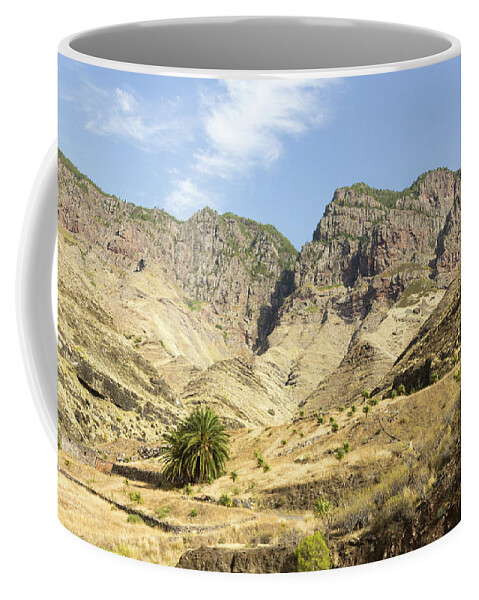 Mountain Coffee Mug featuring the photograph Arid rocky mountain by Josu Ozkaritz