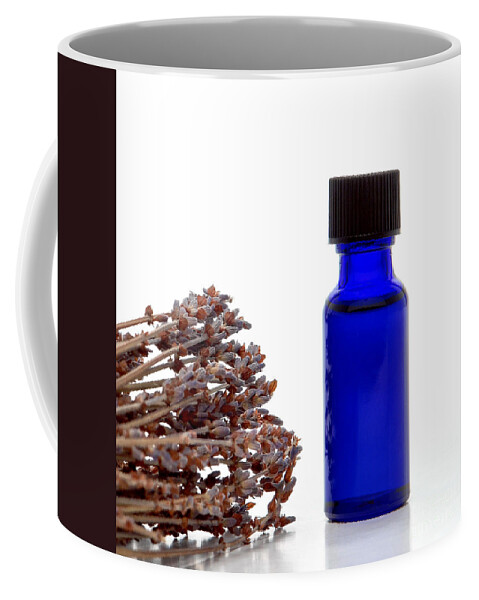Aromatherapy Coffee Mug featuring the photograph Aromatherapy Lavender Extract Essential Oil Bottle by Olivier Le Queinec