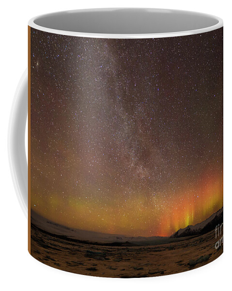 Iceland Coffee Mug featuring the photograph Aurora and milky way, Iceland by Neale And Judith Clark