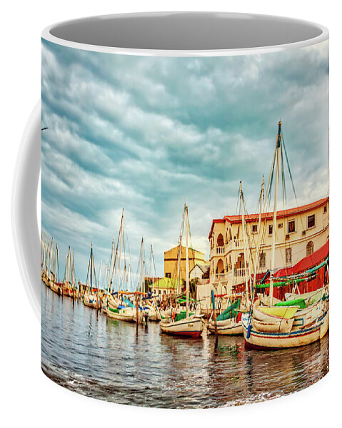 Harbor Coffee Mug featuring the photograph Belize City Harbor at golden light by Tatiana Travelways