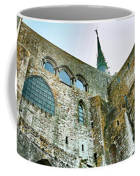 Mont Saint Michel Coffee Mug featuring the photograph Beneath the Wings of Saint Michel by Susan Maxwell Schmidt