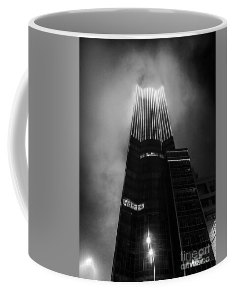 Fog Coffee Mug featuring the photograph Skyscraper in fog by Mendelex Photography