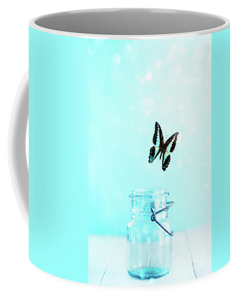 Bluebottle Coffee Mug featuring the photograph Bluebottle Butterfly Escaping a Blue Mason Jar by Stephanie Frey
