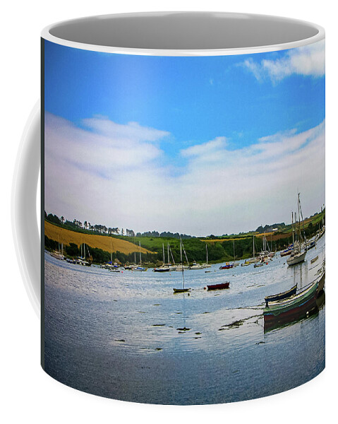 Brittany Coffee Mug featuring the photograph Boats under a blue sky by Jim Feldman