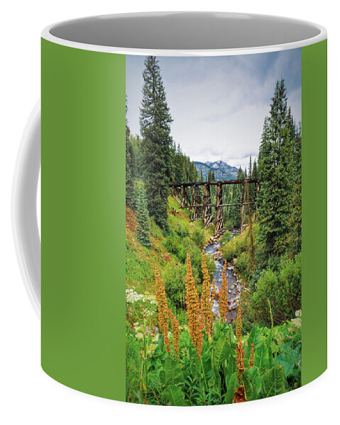 Mountain Coffee Mug featuring the photograph Bridge down a Backroad by Go and Flow Photos
