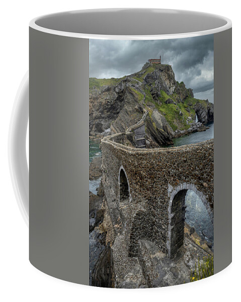 Coast Of Biscay Coffee Mug featuring the photograph Bridge to Gaztelugatxe by Micah Offman