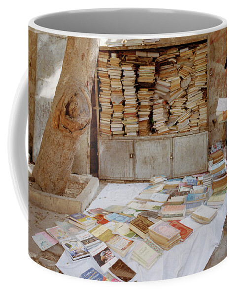 Cairo Coffee Mug featuring the photograph Cairo Street Library by Shaun Higson