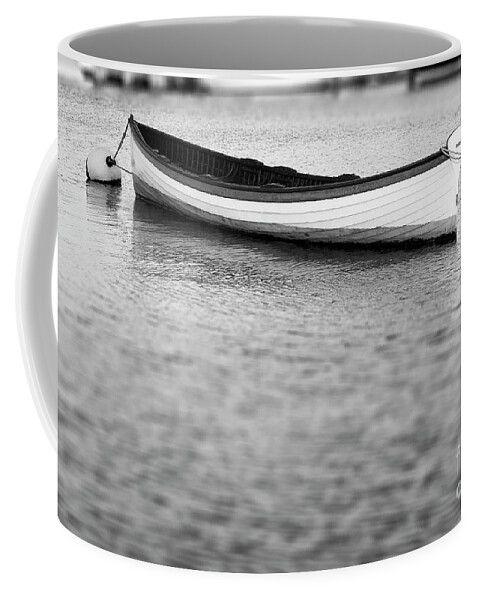Canoe Coffee Mug featuring the photograph Canoe in harbor by Tony Cordoza
