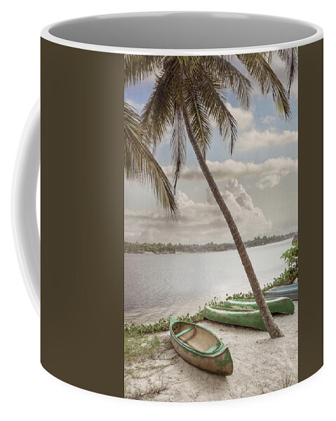African Coffee Mug featuring the photograph Canoes Waiting on the Beach in Soft Cottage Hues by Debra and Dave Vanderlaan