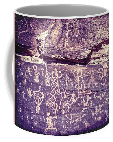 Southwest Coffee Mug featuring the photograph Carvings On Rock Wall by Phil Perkins