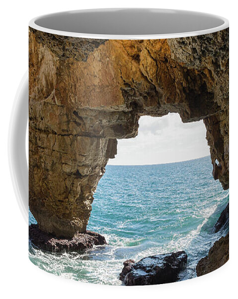 Coast Coffee Mug featuring the photograph Cave on the Mediterranean coast, Cova del Arcs by Adriana Mueller