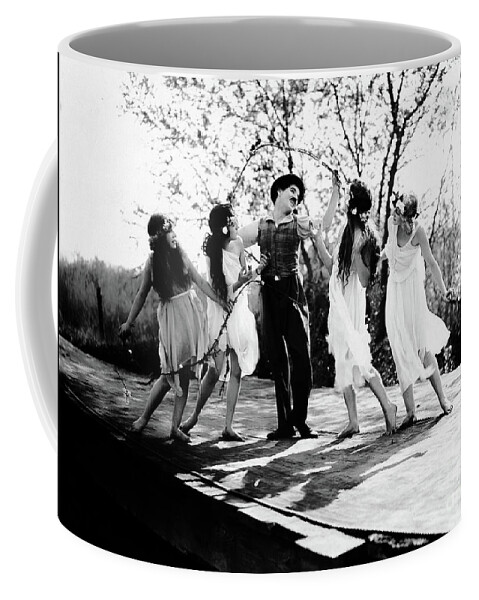 Dancing Coffee Mug featuring the photograph Charlie Chaplin Frolicking with Dancing Nymphs by Sad Hill - Bizarre Los Angeles Archive