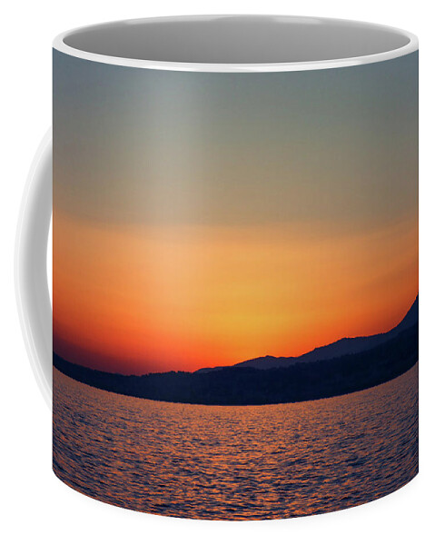 Sunset Coffee Mug featuring the photograph Coastline Silhouette by Andrea Whitaker