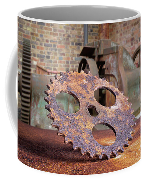 Cog Coffee Mug featuring the photograph Rusty cog by Average Images