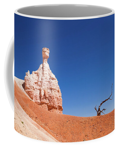 America Coffee Mug featuring the photograph Dead tree and hoodoo in Bryce Canyon National Park by Jean-Luc Farges