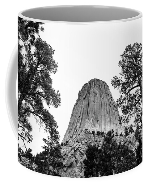 Devils Tower Long Exposure Coffee Mug featuring the photograph Devils Tower Black And White Base View by Dan Sproul