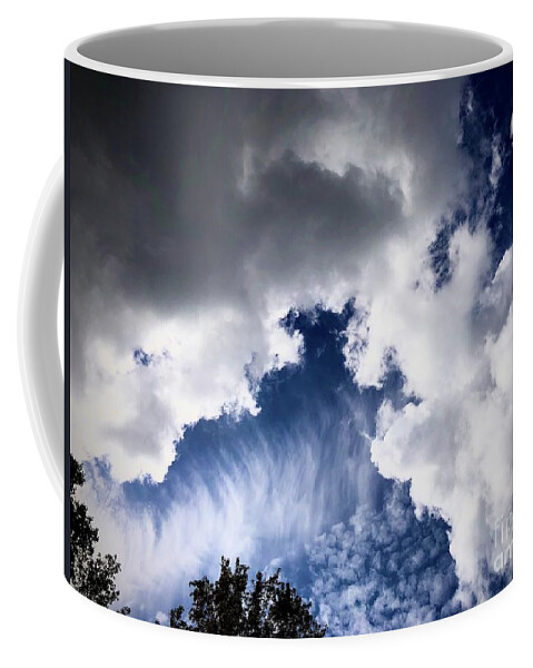 Clouds Coffee Mug featuring the photograph Dispute by J Hale Turner