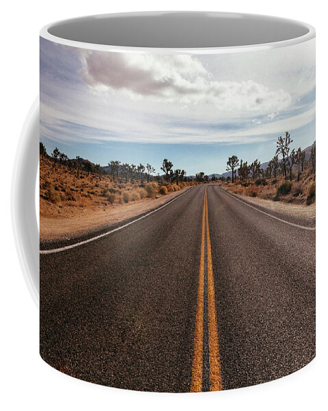 Joshua Tree Coffee Mug featuring the photograph Drive Through Joshua Tree National Park by Laura Tucker