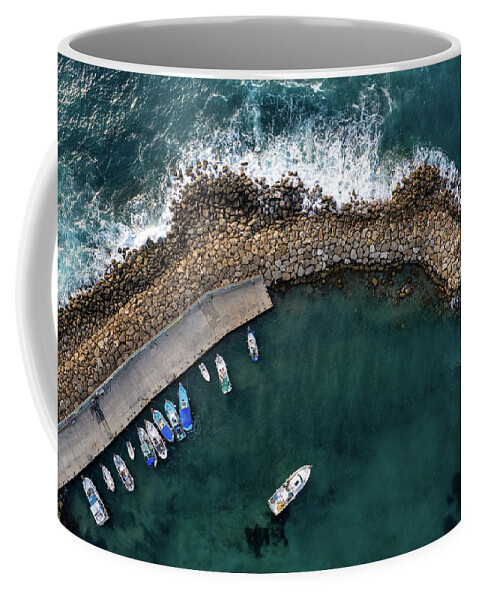 Fishing Harbor Coffee Mug featuring the photograph Drone aerial fishing harbour with boats stormy waves, blue sea by Michalakis Ppalis