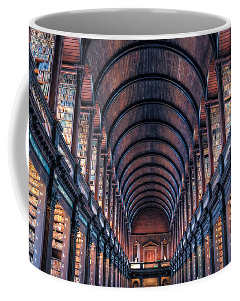 https://render.fineartamerica.com/images/rendered/default/frontright/mug/images/artworkimages/medium/3/dublin-trinity-college-library-travel-poster-design-turnpike.jpg?&targetx=150&targety=0&imagewidth=499&imageheight=333&modelwidth=800&modelheight=333&backgroundcolor=52434E&orientation=0&producttype=coffeemug-11