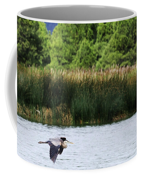 Heron Coffee Mug featuring the photograph Ephemeral Summer Flight by Laura Putman